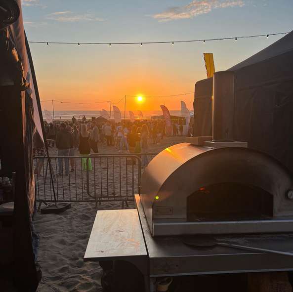 Someone kneading pizza dough